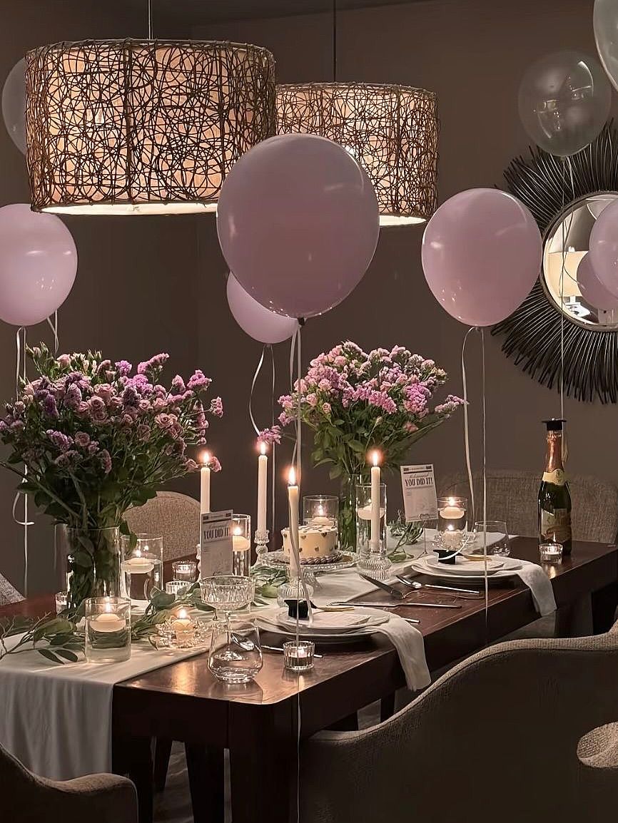 Birthday dinner with balloons and flowers